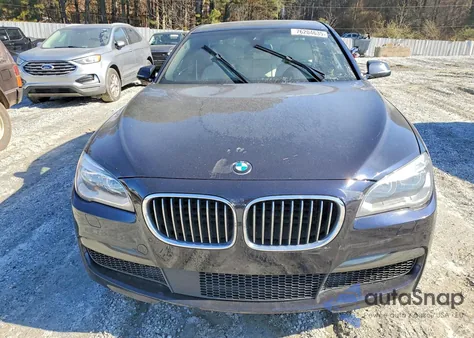 2015 BMW 750 I z USA, uszkodzony, nr VIN WBAYA8C58FD825448